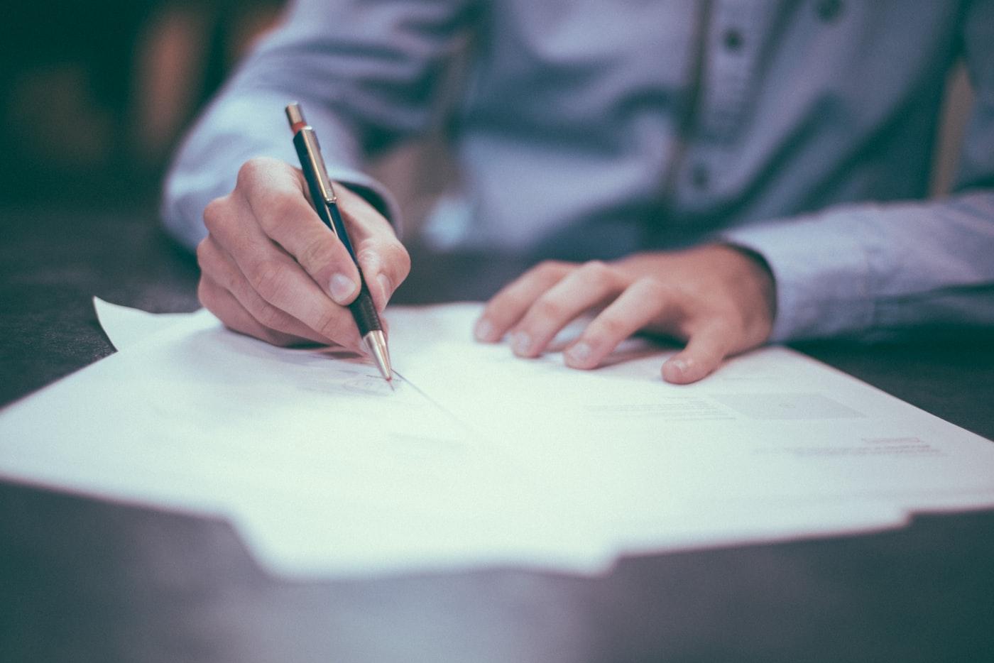 Close-up of paperwork and documents on a desk